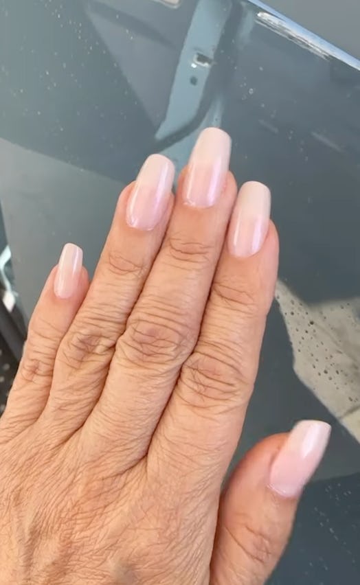 Jennifer Lopez hands with light pink summer blush nails