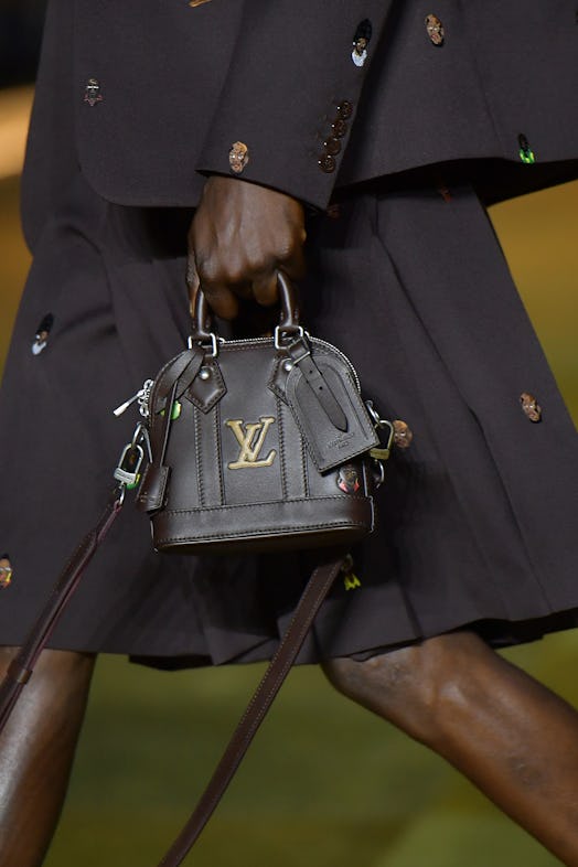 A model,details, walks the runway during the Louis Vuitton Menswear Spring/Summer 2024 show as part ...