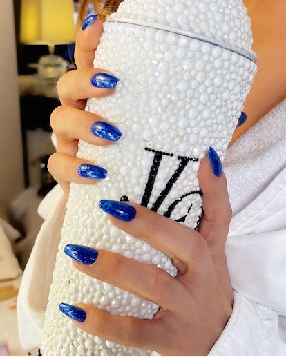 Jennifer Lopez royal blue nail polish in coffin shape