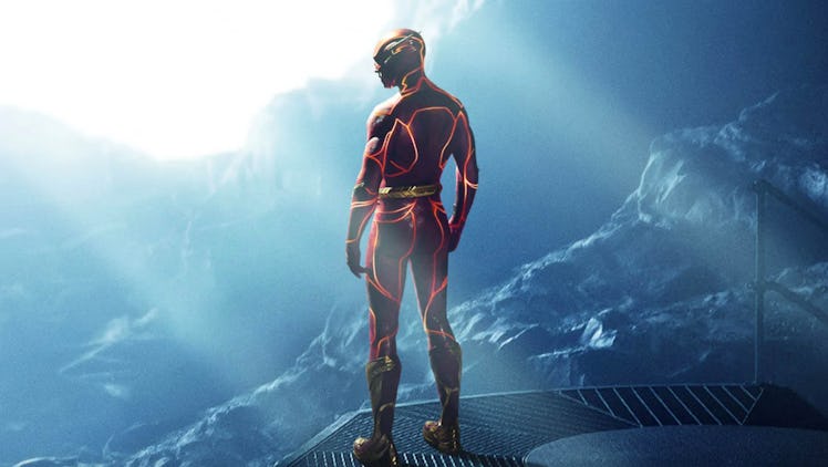 Barry Allen (Ezra Miller) stands in the Batcave on a poster for The Flash