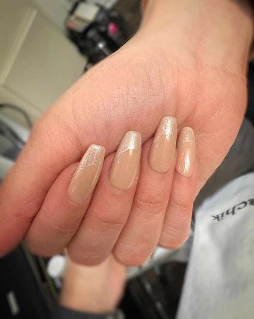 Jennifer Lopez gold glitter french tip nails 
