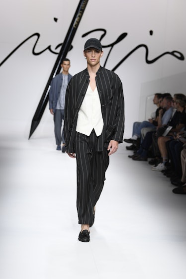 Model on the runway at the Giorgio Armani Spring 2024 Menswear Collection Fashion Show at Armani Hea...