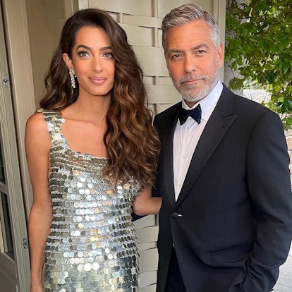 Amal and George Clooney tight curls and shimmery makeup nude lipstick