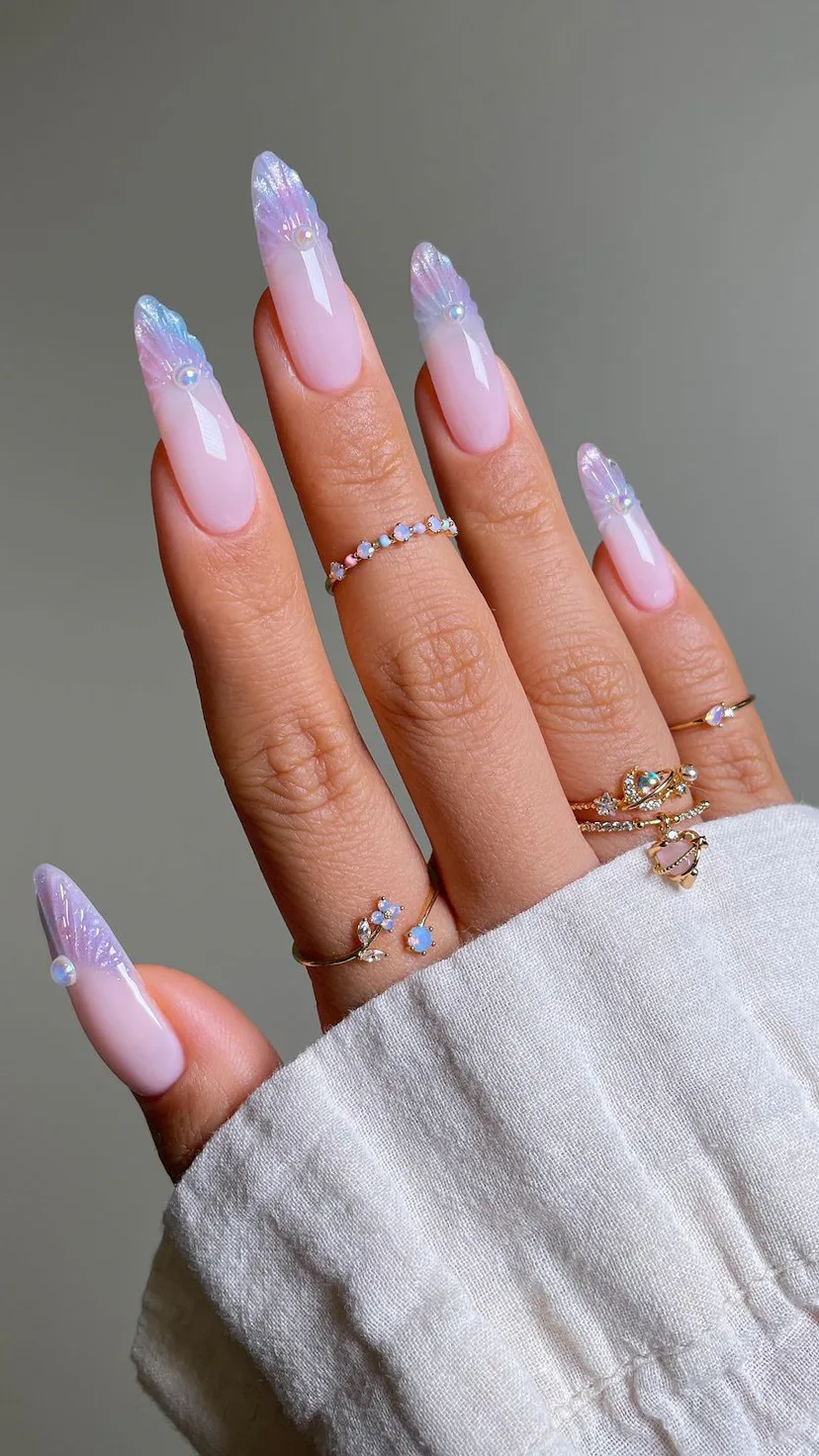 Seashell pearl nails are the perfect nail art design idea for cancer season 2023.