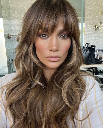 Jennifer Lopez blunt bangs with highlights