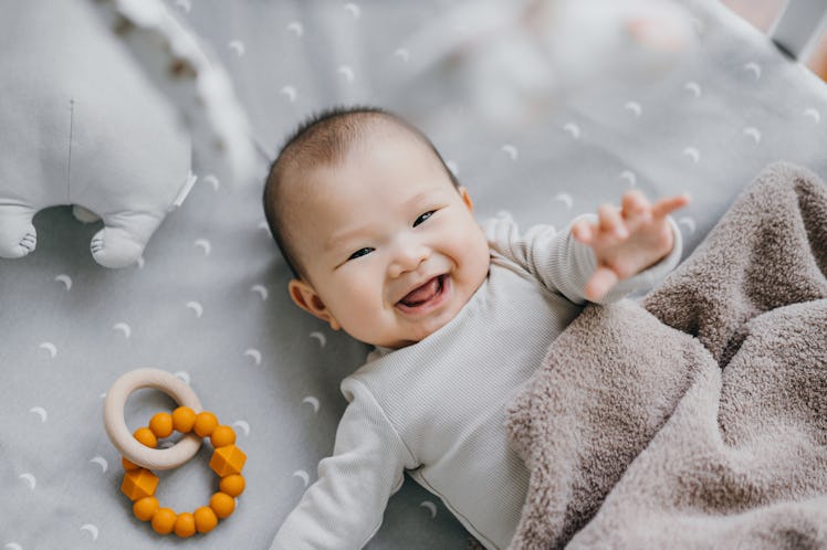 A baby girl laughing.