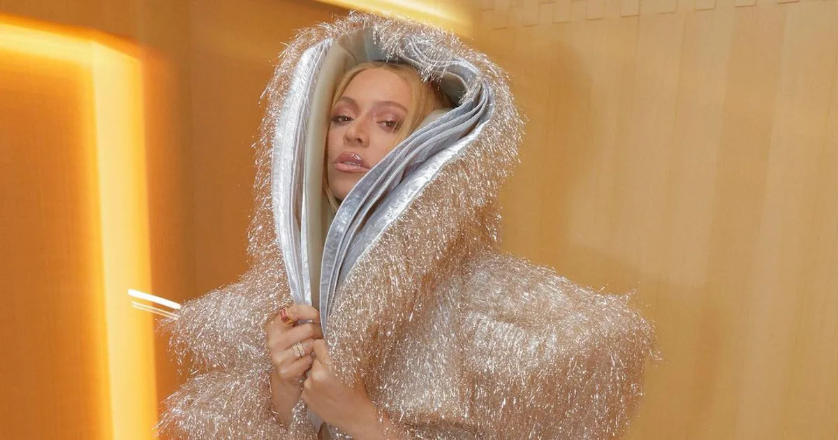 Beyoncé Wears a Silver Jacket and Skirt For the Louis Vuitton Party