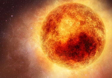image of a red supergiant star in fiery reds, yellows, and oranges on a dark background