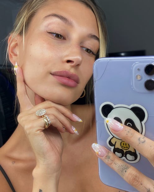 Throwback to a previous Instagram post of Hailey Bieber rocking daisy nails 