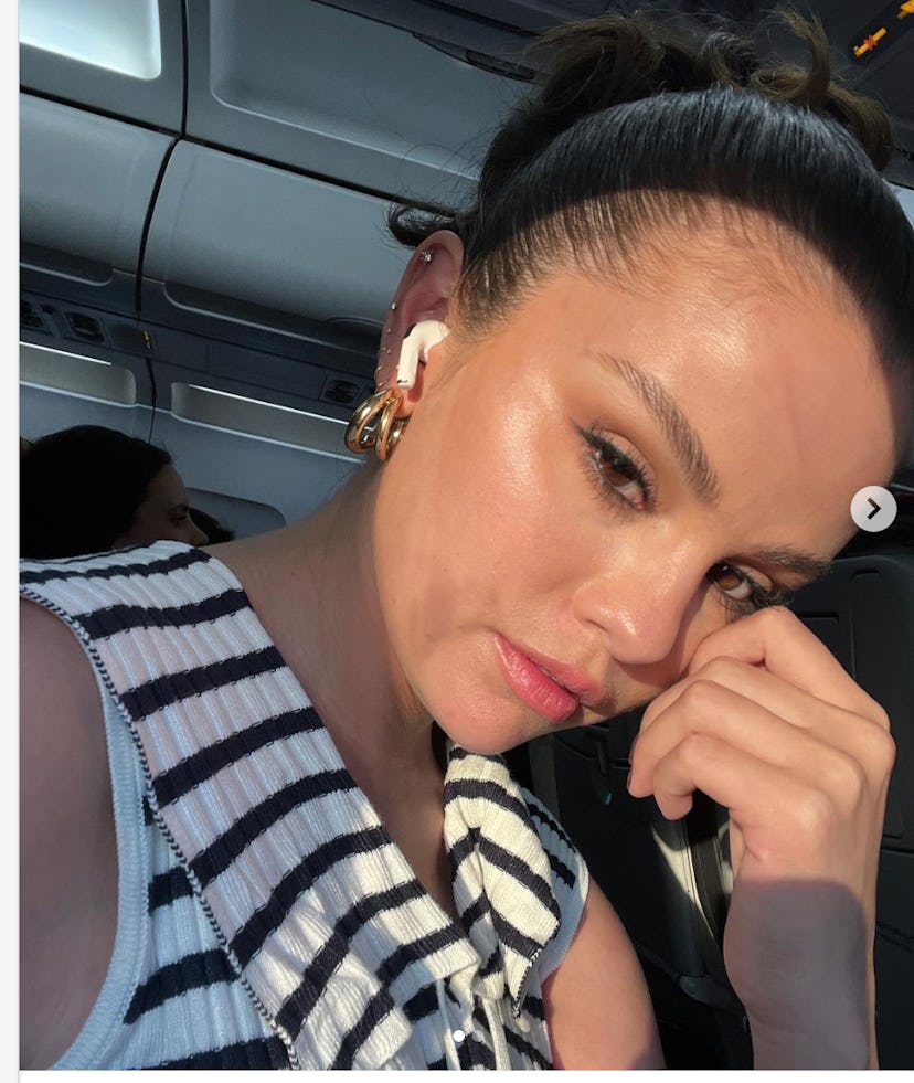 Selena Gomez cartilage piercings up ear 2023