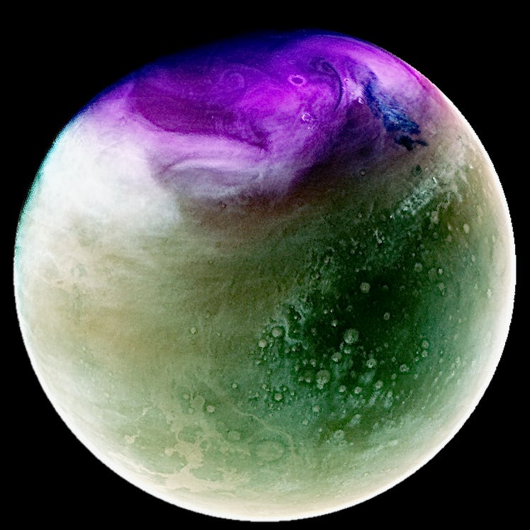 false-color image of Mars in shades of purple, white and green on a black background