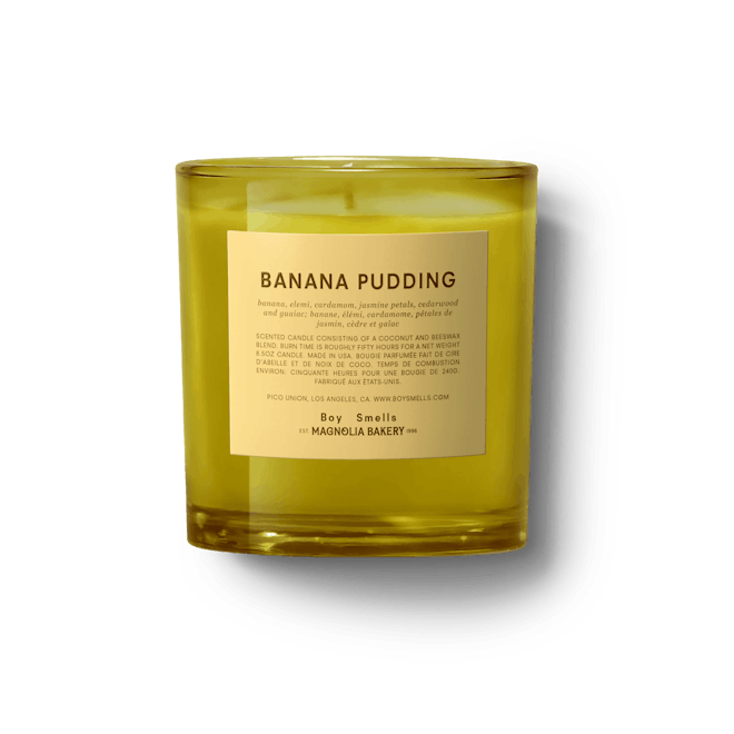 boy smells Banana Pudding Candle