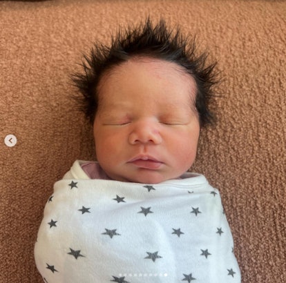 Chrissy Teigen's baby boy has the best hair.
