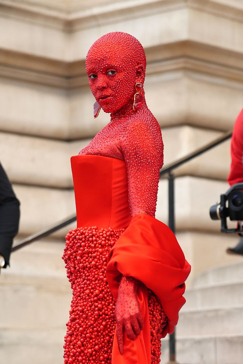Doja cat in all red at the Schiaparelli Haute Couture show.