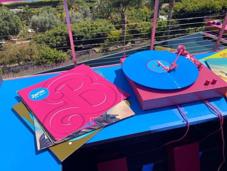 The Barbie house in Malibu that looks like her DreamHouse and hosted by Ken has a record player. 