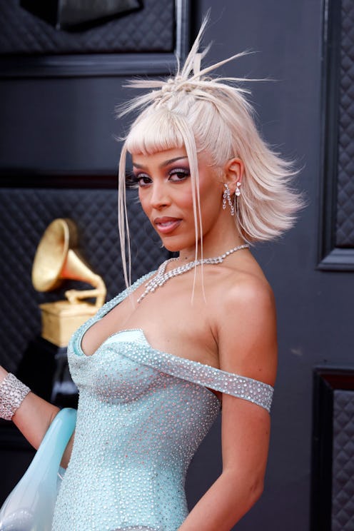 Doja Cat's hair evolution, from 2014 to today.