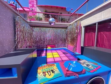The Mojo Dojo Casa House like Barbie's DreamHouse in Malibu has a disco dance floor with roller skat...