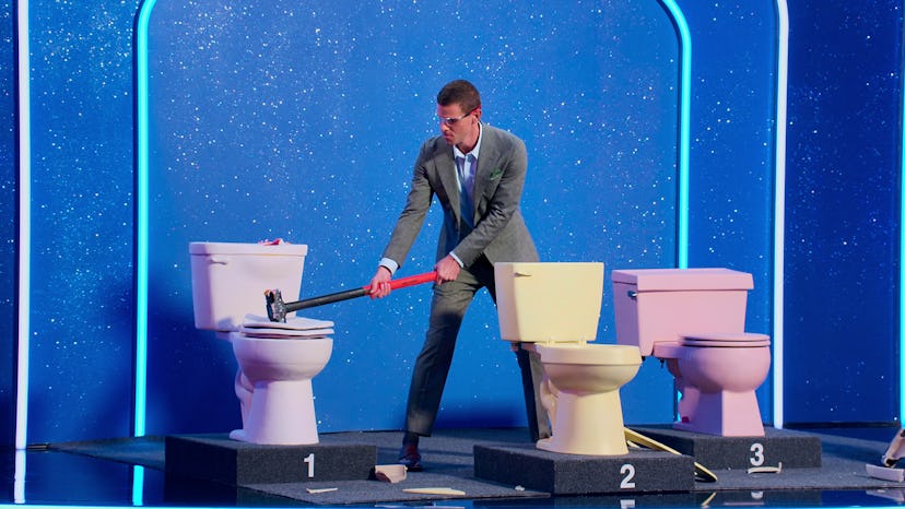 Mikey Day smashing a toilet-shaped cake on 'Is It Cake, Too?'