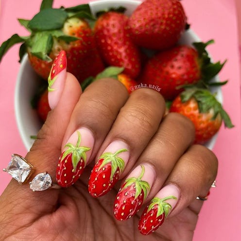 Here are the sweetest nail art design ideas for strawberry nails.