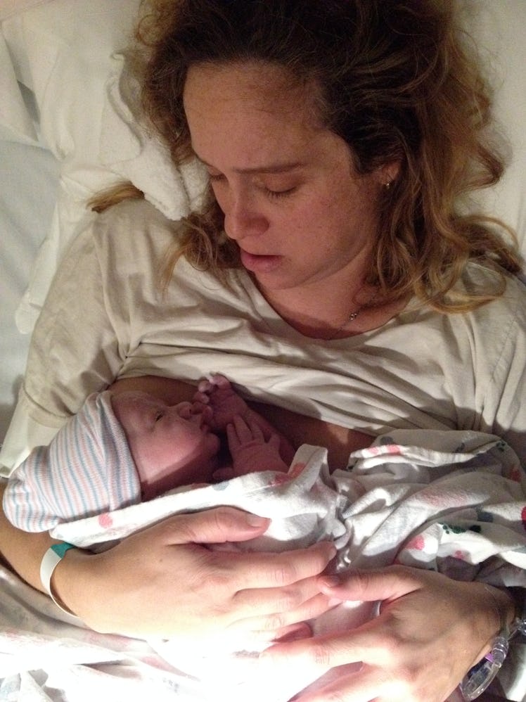 Author Caitlin Shetterly holds her newborn baby shortly after he is born.