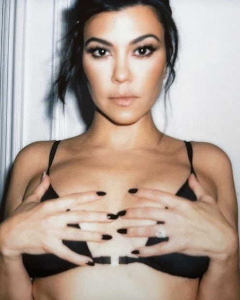 Kourtney Kardashian black nails and pushup bra 2023