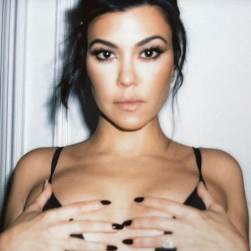 Kourtney Kardashian black nails and pushup bra 2023