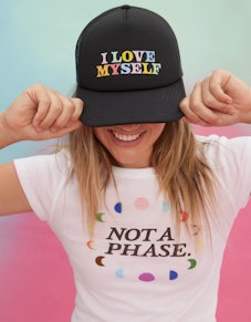 Olivia Ponton’s pride trucker hat says “I love myself."
