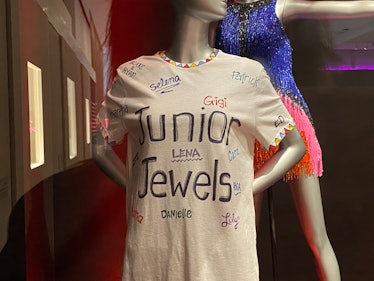 The Taylor Swift museum exhibit in New York has the Junior Jewels shirt with Taylor's squad names on...