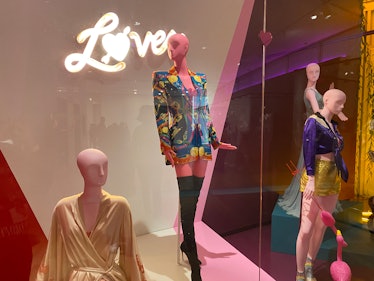 The Taylor Swift exhibit in NYC has 'Lover' costumes from the "You Need To Calm Down" music video. 