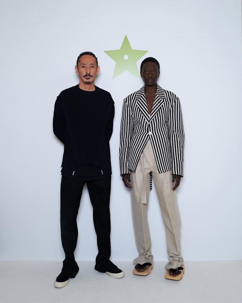 Setchu designer Satoshi Kuwata and a model wearing his designs