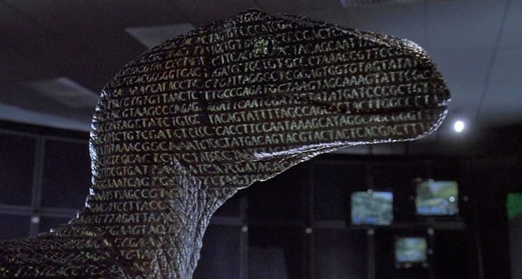 A Raptor stands in front of a projector's light in Jurassic Park