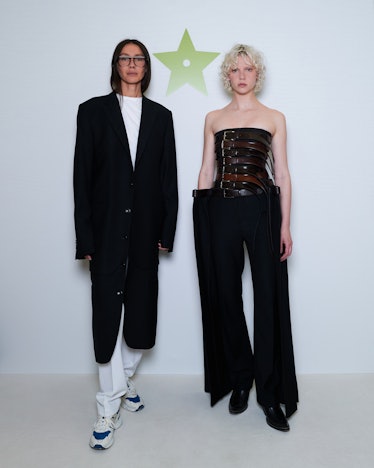 Paris, France, June 7, 2023. Satoshi Kuwata (C), the Japanese designer and  founder of clothing brand Setchu, poses for photo after winning the 2023  LVMH Prize for Young Designers, one of the