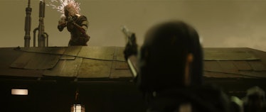 Din Djarin blasts an HK-87 droid — similar to HK-47 — in The Mandalorian Season 2.