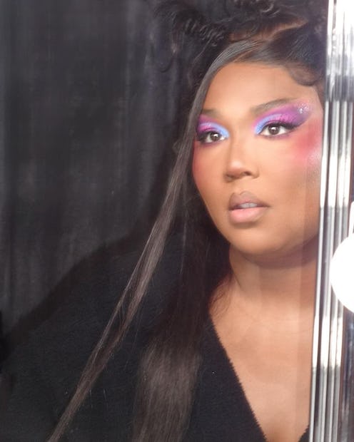 Lizzo purple and blue eye makeup on Special Tour