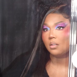 Lizzo purple and blue eye makeup on Special Tour