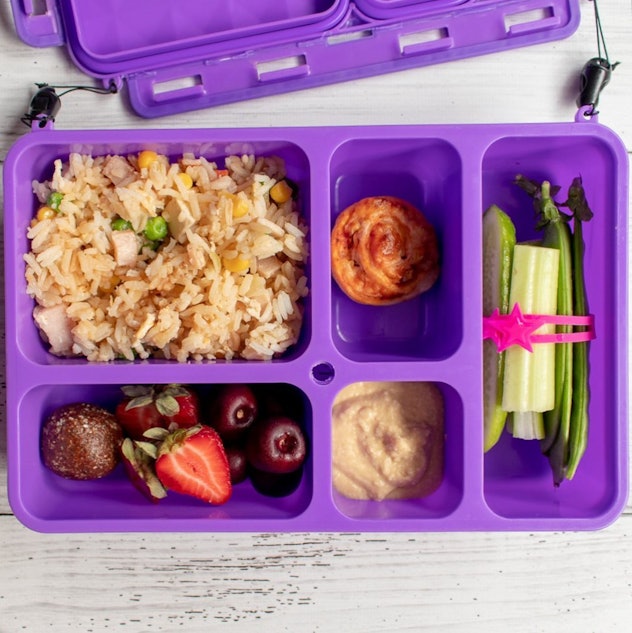 A school lunch idea with fried rice and sides.