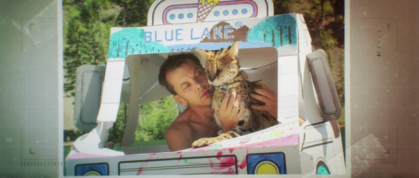 Gerald Blanchard with one of his wild cats in a still from 'The Jewel Thief' via Hulu's press site