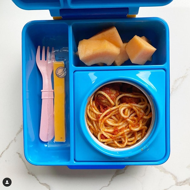 Spaghetti and fruit slices, in a story about school lunch ideas.