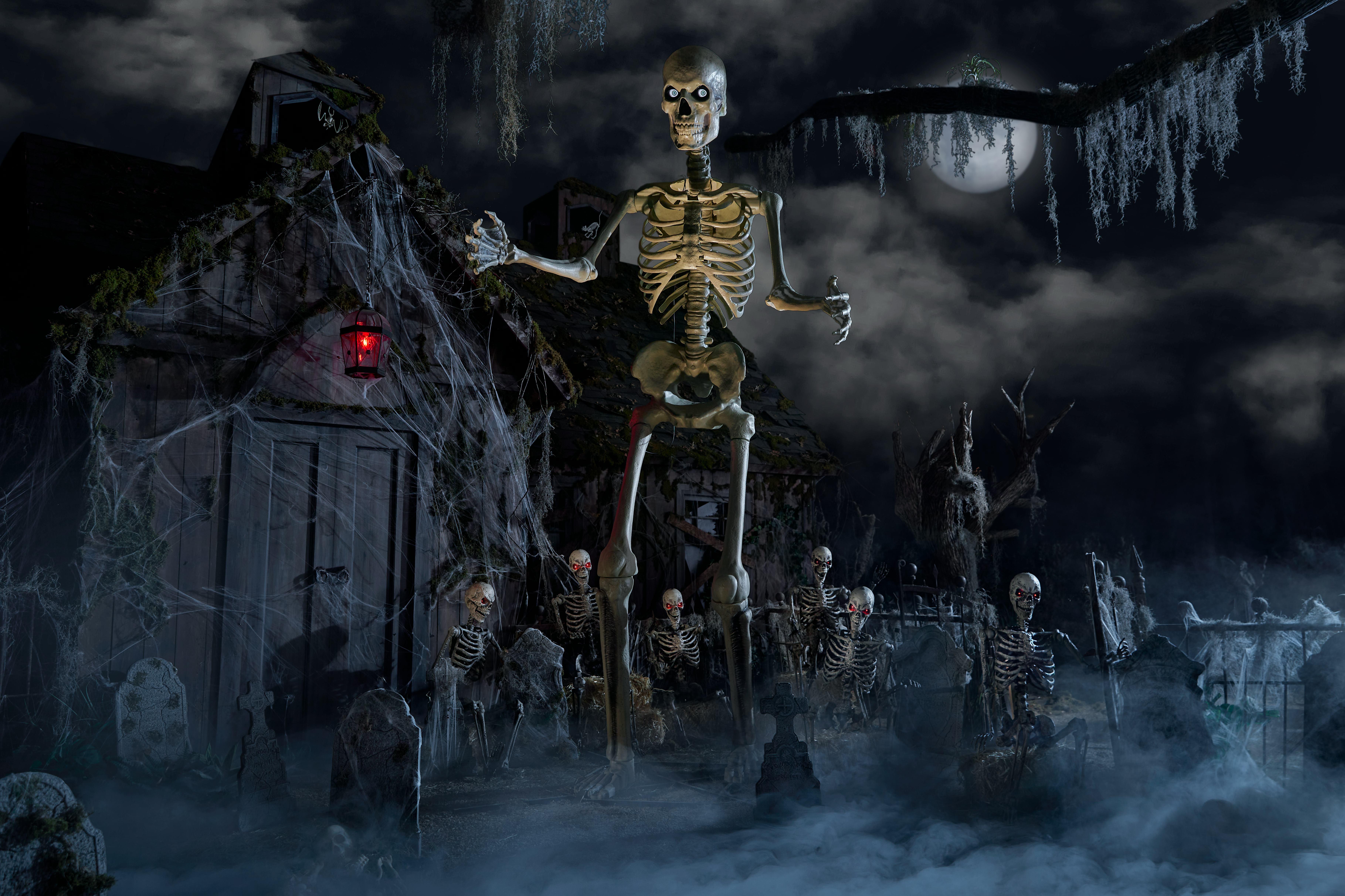 12-foot skeleton from Home Depot stands in graveyard set