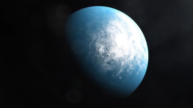a blue exoplanet half covered in darkness