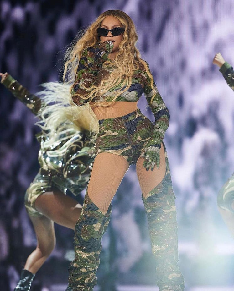 Beyoncé wears a custom Ivy Park sequined camouflage look during the Philadelphia concert of her 'Ren...