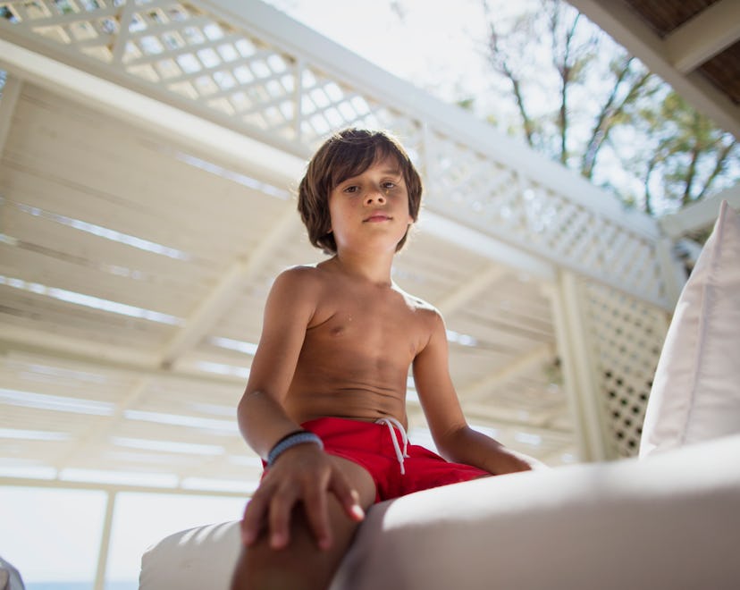 bored little boy at summer camp