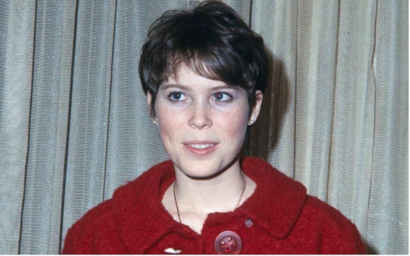 Prudence Farrow Bruns wearing a red jacket