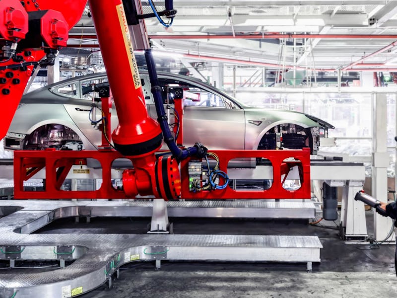 Tesla factory manufacturing an EV
