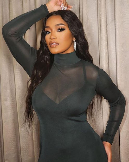 Keke Palmer long mermaid waves and sheer turtleneck