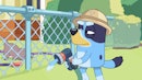 Bandit holding a hose in 'Bluey'