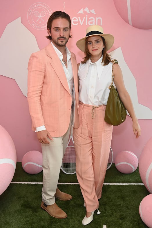 Alex Watson and Emma Watson pose in the evian VIP Suite on day fourteen of Wimbledon 2023 on July 16...