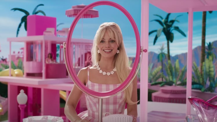 Margot Robbie looks through a mirrorless mirror in 2023's 'Barbie'