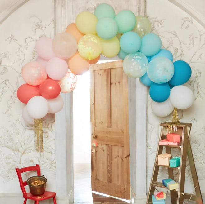 Need rainbow birthday party decorations? Try a Rainbow Balloon Arch Kit.