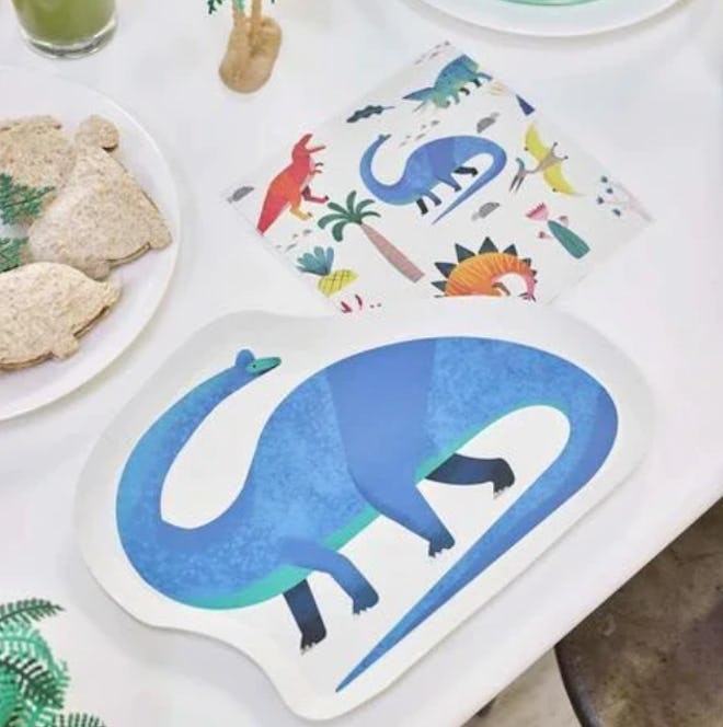 Need dinosaur birthday party decorations? Consider these blue dinosaur shaped plates.